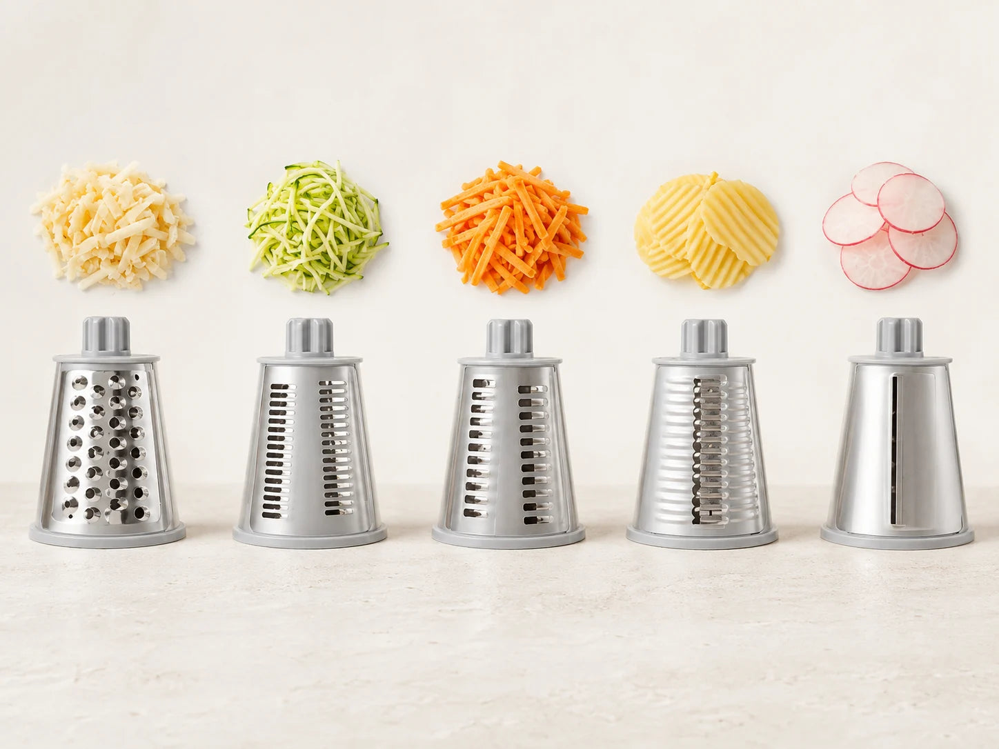 Five interchangeable steel cutting drums and examples of their different food textures